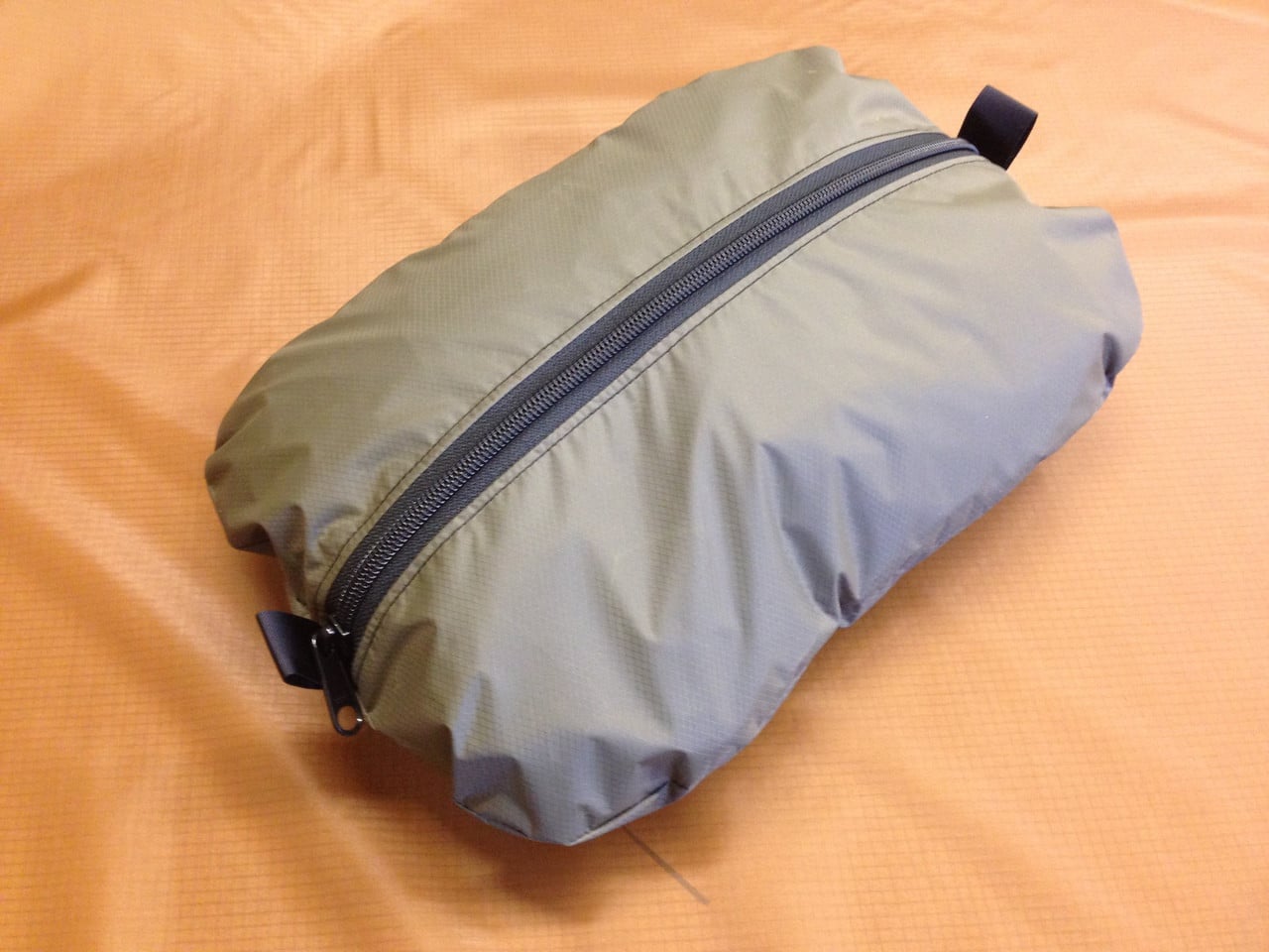 lightweight organization pocket with full length zipper