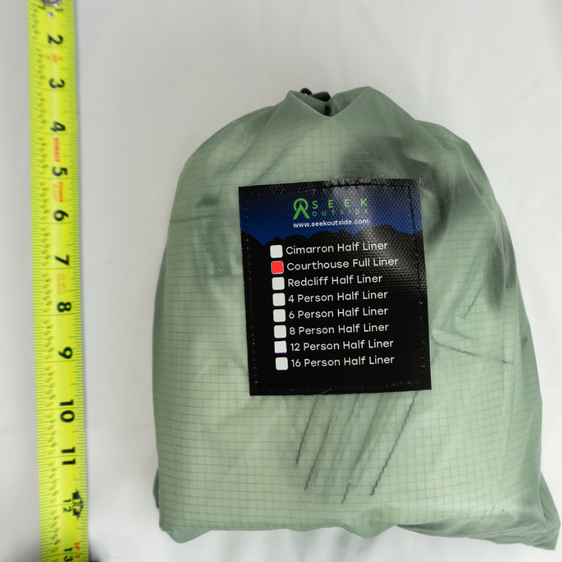 courthouse liner packs down small in the included stuff bag