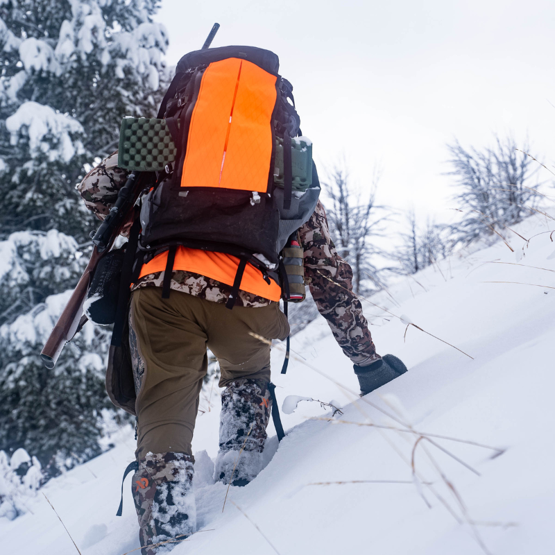 Blaze Orange Talon on a hunting pack, adds visibility for hunters while also adding storage, organization, and compression