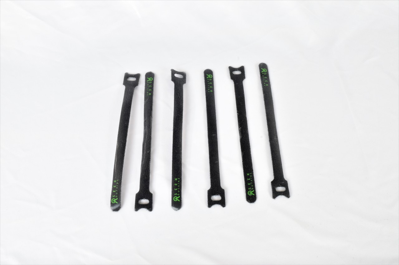set of six straps to keep backpack webbing neat