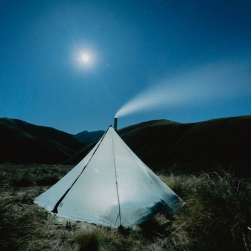 cimarron hot tent with smoke curling out of the stove pipe