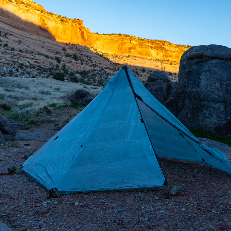 ultralight dyneema floorless pyramid tent with center pole and stake-out loops around the perimeter