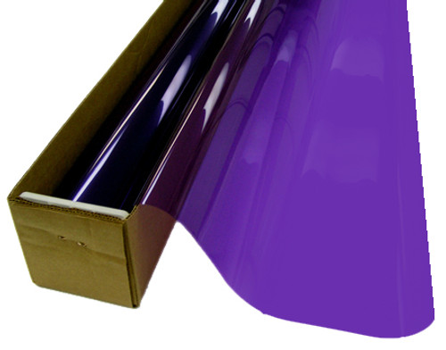 A roll of Light Purple-colored window film is partially unrolled from a cardboard box.