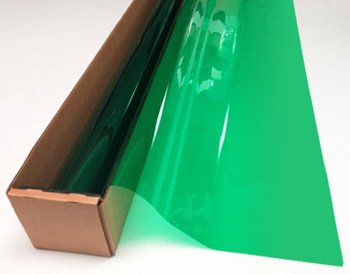 A roll of Seafoam-colored window film is partially unrolled from a cardboard box.
