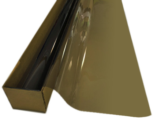 A roll of Light Bronze-colored window film is partially unrolled from a cardboard box. A roll of Light Bronze-colored window film is partially unrolled from a cardboard box.