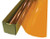 A roll of Amber-colored window film is partially unrolled from a cardboard box.