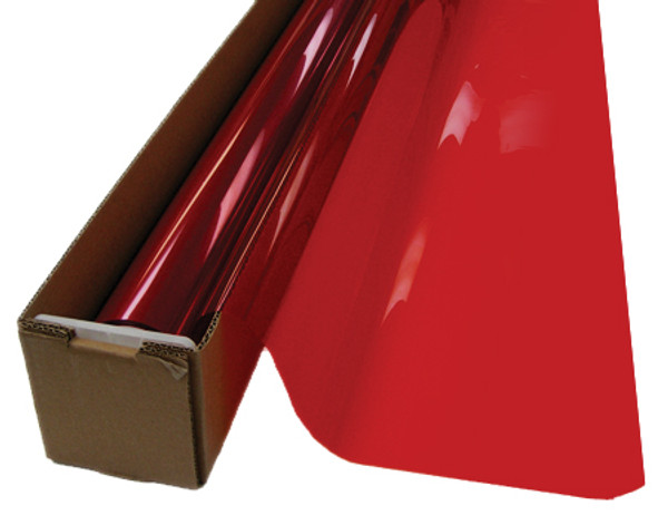 A roll of Fire Red-colored window film is partially unrolled from a cardboard box.