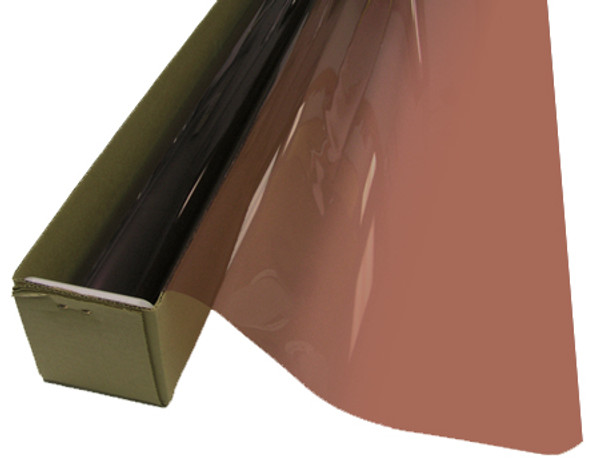 A roll of Mauve-colored window film is partially unrolled from a cardboard box.
