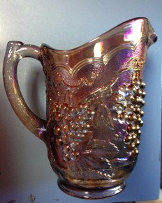 Carnival Glass Pitcher Grape and Vine Pattern and 6 Matching Gasses