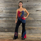 WEST LA PANTS WEST LA PANTS crafted from cotton lycra with solid panels and adorned with Grateful Dead Steal Your Face mandala and bolt embroidery, perfect for adding a rock 'n' roll edge to your wardrobe.