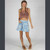 DENIM DRIFT MINI SKIRT Stretch Denim Patch Mini Skirt w/ Attached Pouch Pocket & Back Elastic Waist