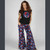 IN THE DARK T-SHIRTCotton Lycra Cap Sleeve T-Shirt w/ Sequin Grateful Dead Steal Your Face Applique'