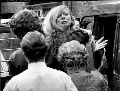 32651991-Joyce McKinney crying as she is put into police van The Mormon