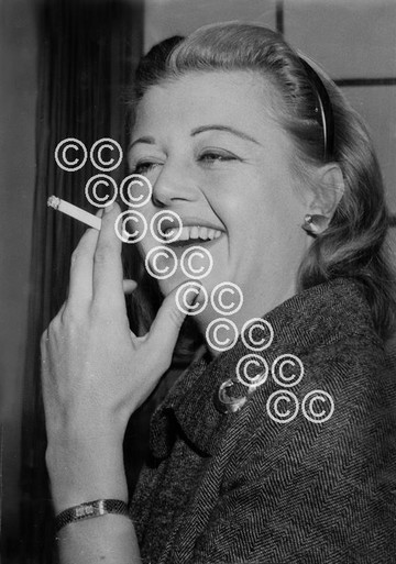 37376329-Actress Angela Lansbury smoking a cigarette in Paris . - Newsprints