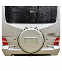 Mercedes Class C Sprinter Van with Boomerang MasterSeries Continental Kit Hard Tire Cover with integrated license plate pocket.