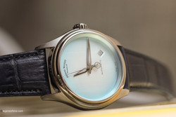 Close-up of Armand Nicolet A740C dial showing date window at 6 o’clock and leaf-shaped hands