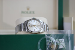 Rolex Oyster Perpetual 41mm model 124300 Silver Dial, Smooth Bezel Oyster Bracelet, Unworn Complete.  Available for sale in stock at Legend of Time Chicago watch store.