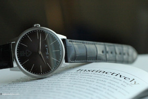 Introducing the Corum Heritage La Grande Vie watch, a stylish timepiece designed with elegance and sophistication. This watch features a black dial with non-numeric hour marks, and a silver bezel, all enclosed in a 42mm round titanium case. The black crocodile leather strap adds a touch of luxury. With a mechanical automatic movement and exhibition caseback, this watch seamlessly blends form and function. It comes complete with original box, papers, and manual. A perfect choice for those who appreciate impeccable craftsmanship and timeless design. Introducing the Corum Heritage La Grande Vie watch, a stylish timepiece designed with elegance and sophistication. This watch features a black dial with non-numeric hour marks, and a silver bezel, all enclosed in a 42mm round titanium case. The black crocodile leather strap adds a touch of luxury. With a mechanical automatic movement and exhibition caseback, this watch seamlessly blends form and function. It comes complete with original box, papers, and manual. A perfect choice for those who appreciate impeccable craftsmanship and timeless design.