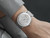 Junghans Max Bill Regulator 027/4492.46 automatic watch with white dial and stainless steel bracelet on the wrist