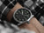 On the wrist Junghans Pilot Automatic dark grey dial with date at 12 and small seconds