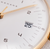 Matte white dial with gold hands on Junghans Max Bill Damen