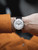 Junghans 27/3380.02 silver dial with tachymeter and red telemeter scales on the wrist