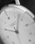 Junghans Max Bill Automatic silver dial with numerals and date window close-up