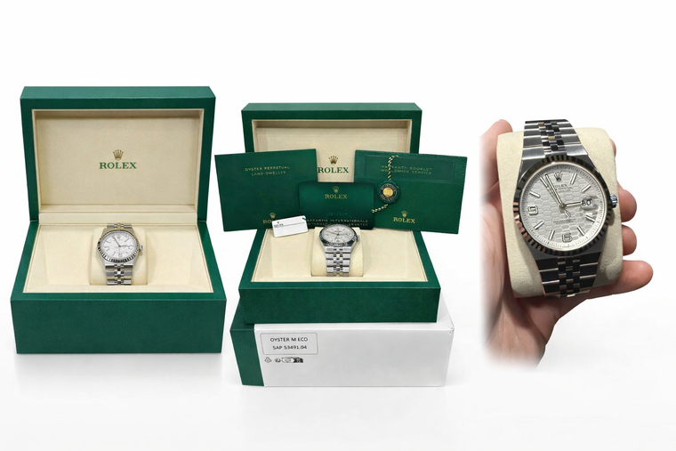 Close-up of Rolex Land-Dweller 40 white honeycomb dial with fluted white gold bezel and Flat Jubilee bracelet