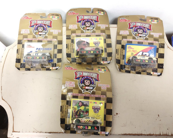 Lot 4: 1998 Racing Champions Toys 'R Us Gold 1:64 - #99, #97, #42, #11 - Damaged