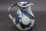 Experimental Splashy Pitcher, roughly 6" wide (including handle) by 6" tall, (SK7941)