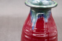 Ruby Red Vase with copper rim, roughly 3.5" wide 6.5" tall with 1.5" opening (SK7892)