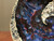 Cosmic Wall Platter (SK4840), Porcelain and Cobalt, Iron, 24 Karat gold and wood ashes, roughly 14" diameter by 2.5" thick, approx 10 pounds.