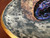 Cosmic Wall Platter (SK6100), Porcelain and Cobalt, Iron, 24 Karat gold and wood ashes, roughly 17" diameter by 3" thick, approx 10 pounds.