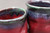 Pair of small Ruby Red Cups with copper rim, roughly 4-6oz. each (SK8516)