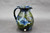 Neon Cosmic Pitcher, roughly 6.5" wide (including handle) by 8" tall, (SK0369)