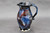 Cosmic Pitcher, roughly 6.5" wide (including handle) by 9" tall, (SK0374)
