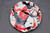 Splashy Red Spoon Rest, roughly 5" wide by 1.25" tall (SK0799)
