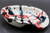  Splashy Red Spoon Rest, roughly 5" wide by 1.25" tall (SK0800)