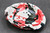 Splashy Red Spoon Rest, roughly 5" wide by 1.25" tall (SK0801)