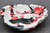Splashy Red Spoon Rest, roughly 5" wide by 1.25" tall (SK0801)