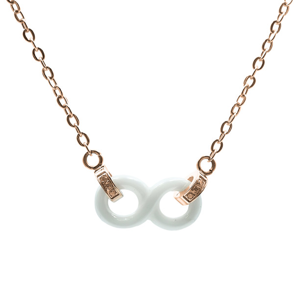 Collier en acier inoxydable rosé & céramique blanche, zircons et motif infini