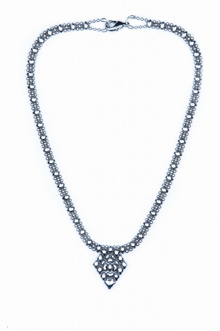 We carry this nickel necklace in size 15 in.  Its width is 1 in.  Custom sizes are available with 8-week delivery.  For help with sizing, please contact us by phone:  Shop hours are 10:00 - 6:00 daily, Central Time, from May through December, and 10:30 - 5:00 January through April.