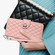 iPhone 16e Rhombic Texture Flip Leather Phone Case with Lanyard - Coral Pink