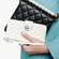 iPhone 16 Rhombic Texture Flip Leather Phone Case with Lanyard - White