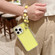 iPhone 16 Pro TPU + PC + Glitter Sequins Full Coverage Phone Case with Bracelet - Yellow