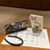 iPhone 14 Charm Eye Electroplating Metal Holder Phone Case with Lanyard - Black