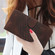iPhone 14 Pro Max YX0060 Elephant Head Embossed Phone Leather Case with Lanyard - Coffee