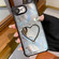 iPhone 16e / 17e Heart-shaped Mirror Electroplated TPU + Acrylic Phone Case with Holder - Black