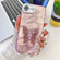 iPhone 16e / 17e Plating Glitter Lens Film Texture Butterfly Holder Wristband Phone Case - Pink Feathers