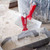 Taping knives and mud pan on job site.